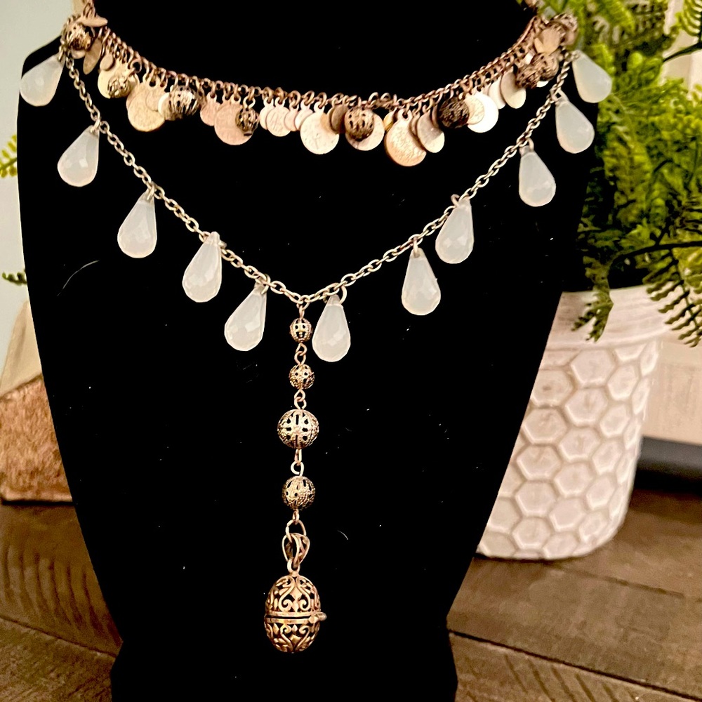 Silver colored with light blue beaded necklace
